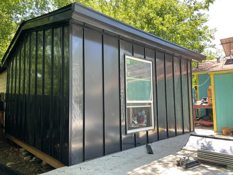 Black standing seam metal wall panels for Roof Inspection in Demopolis